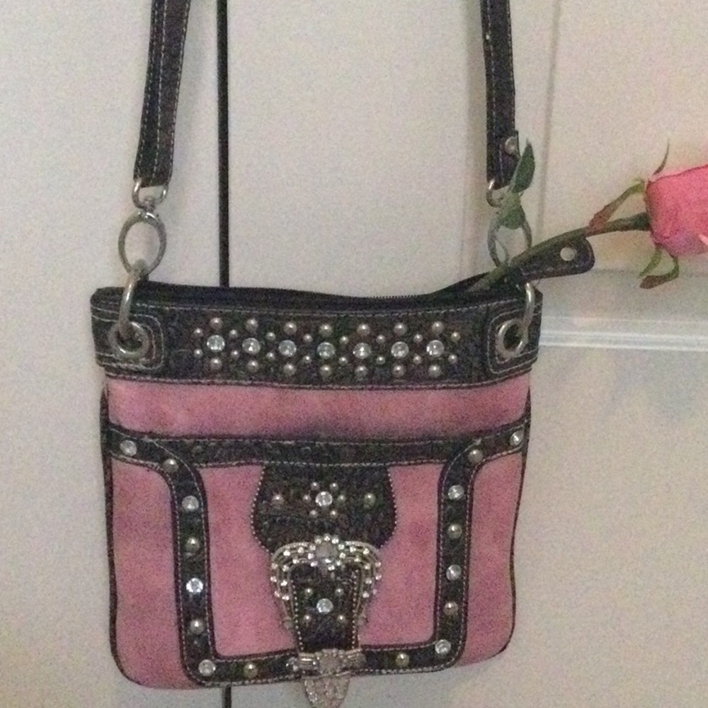 Long crossover, country looking studded pink bag